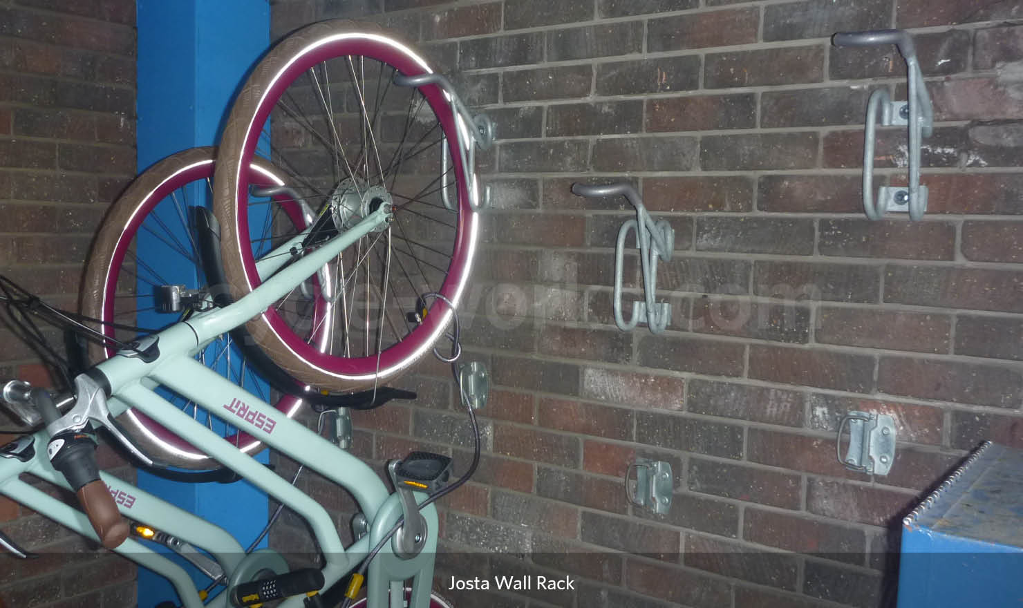 Lockable wall store mounted bike rack